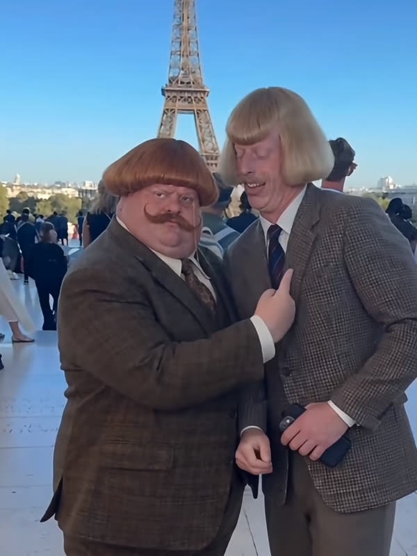 Two AI characters with bowl cuts at the Eiffel Tower