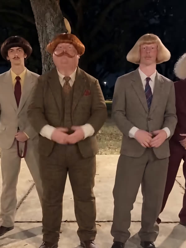 Three AI gentlemen in suits standing in a row at night